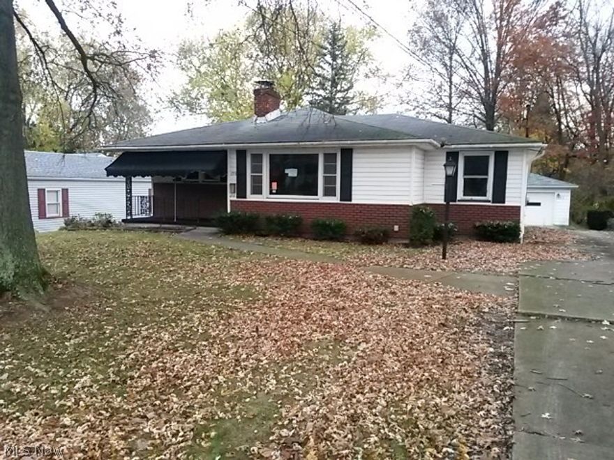 Nice four bedroom home, large living room with fireplace, eat in kitchen and connecting family room.  Also attached enclosed patio.  Full basement with possibilities to be used for additional space.  Half bath in basement.  Home being sold "as is" ask your agent for details.  Home in Columbiana, won't last long with all of the drilling activity.