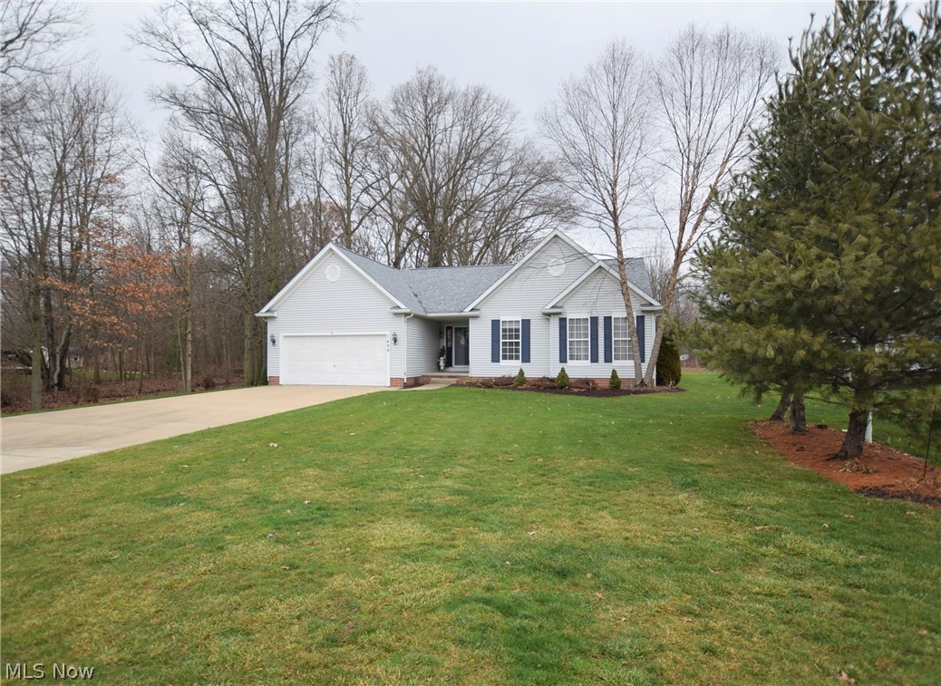 Welcome to 1499 Parsons Drive in Kent (Field Local School District). This 3-bedroom, 2-bathroom ranch sits on a spacious lot in Chapman Farms neighborhood. The eat-in kitchen has newer flooring and lighting fixtures with an abundance of counter and cabinet space. The living room offers a cozy place to relax with two skylights, recessed lighting, a brick fireplace. This home also has a spectacular 3-seasons sunroon overlooking the private backyard. This room is surrounded by windows and has vaulted ceilings, hardwood flooring, and access to the backyard. Not only does the master suite have a wonderful walk-in closet; it also has a large bathroom with dual sinks, a soaking tub, private toilet room, and a shower. Two additional bedrooms, a full bathroom, and a laundry room are all located on the main level. Spacious basement offers a ton of opportunities. Don’t let this home get away! Schedule your private showing today!