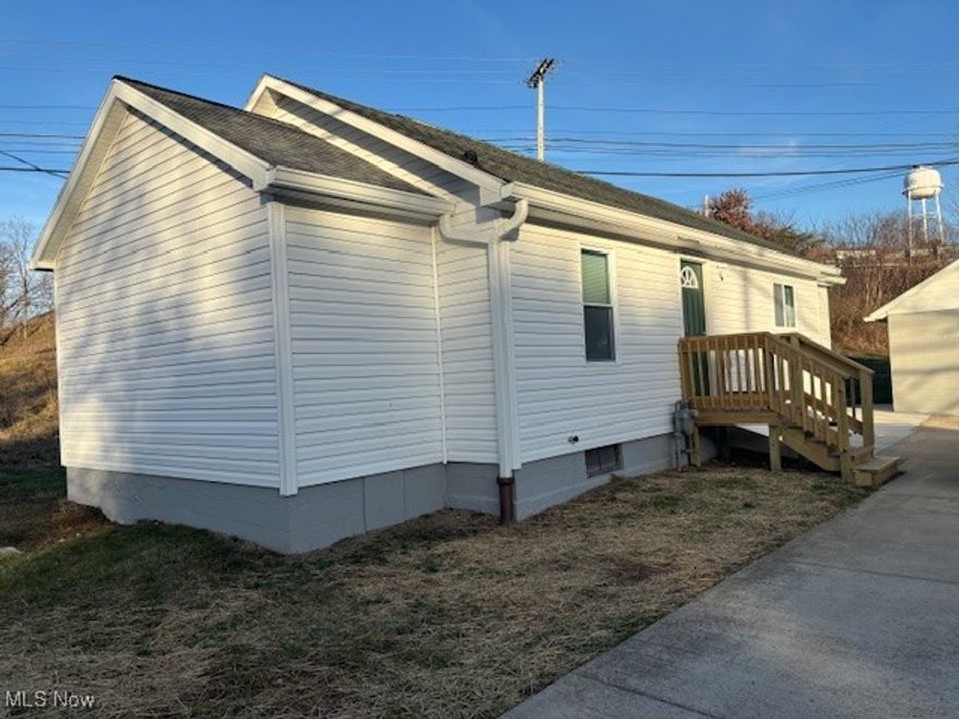 Looking for a move-in ready home? This one is for you! This open concept single story cottage style house is inviting & comfortable. Recently completed remodeled featuring new kitchen cabinets, countertops, flooring, appliances, & roof. Enjoy your morning cup of coffee at the breakfast bar or relax in the stylish new bathrooms. Also boasts oversized detached garage. Conveniently located near schools and shopping. Don't miss out on this one! Schedule a showing today!