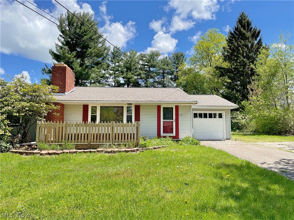 Quaint Burton Village home with 3 bedrooms and 1 bathroom. Kitchen is spacious with slate flooring, built in shelving and all appliances stay. Hardwood floors in all the Bedrooms, Dining Room and Living Room. Brick faced wood burning fireplace in the Living Room. The Lower level is partially finished with another fireplace. A 12x16 wood deck is off the front and a concrete back patio is in the back. 1 car attached garage. A 24 x 40 detached outbuilding with 220 electric, plenty of outlets, and an overhead door. Close proximity to schools, shopping, and Burton Village amenities. 1 year home warranty included.