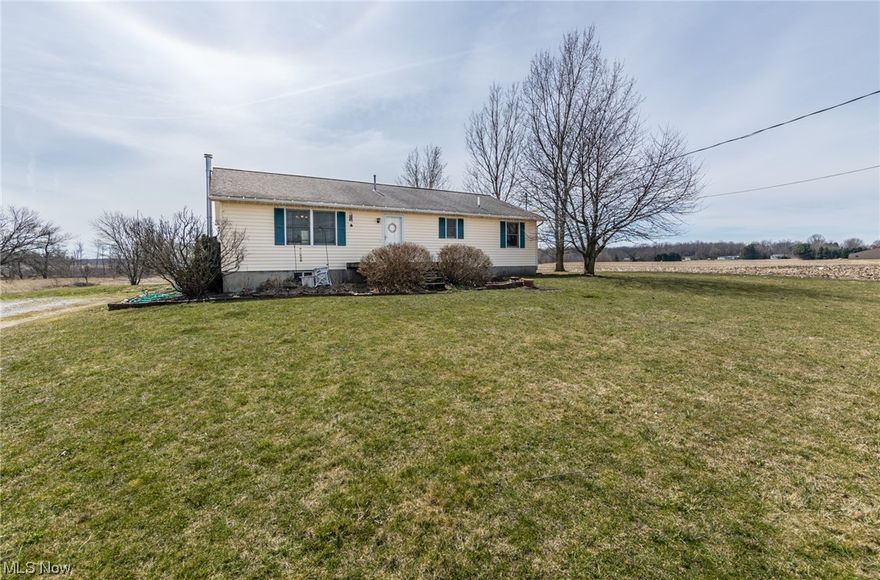 Welcome home! Wake up and enjoy the true country living of Erie County. This 3-bedroom 2 full bath home has a walkout basement and sits on over 1.6 acres. The spacious kitchen has ample cabinet space and flows into the dining room. Cozy living room with fresh neutral paint as well as the kitchen and dining room.  You will find two bedrooms and a full bathroom with new vinyl flooring down the hall from the front entry. The primary bedroom has an attached bathroom with soaking tub and a large walk-in closet.  First floor laundry room with custom barn door cabinets and closet storage. The large family/rec room is in the basement and has a TV wall built in with a storage bench. The other half of the basement is a blank slate for the next owners creative mind and is currently being used as a storage room. Escape to the backyard from the walkout basement and relax in the wood gazebo. Don’t miss out! Schedule a showing now!