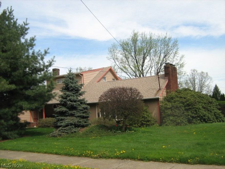 Escape to your own 1+ acre retreat in the city!! The huge backyard provides a wonderful gathering place for family and friends to enjoy the deck, 2 picnic shelters, pool and hot tub. Addition to original house includes cathedral ceiling-fireplaced living room that looks out to the pool area. Elevated formal dining room, spacious kitchen with adjacent laundry. Master bedroom features walk-in closet, cedar lined linen closet and master bathroom. Fireplaced rec room with wet bar. Seller to retain oil & gas rights (signed lease).  Seller providing 1-year America's Preferred Supreme Home Warranty.