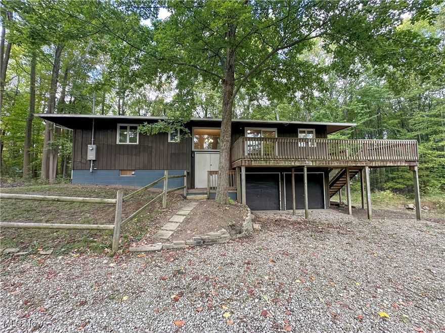 Multiple offers exist deadline, 12/17/24 Tuesday 10 AM EST . Oh my golly - just in time for the holly-days!  Wrap up this raised ranch charmer in the heart of Amherst.  This home is nestled amongst an acre of woods, private driveway, attached garage and a storage shed in rear.  Wrap balcony overlooks a beautifully wooded lot with wildlife.  Lots of light, new carpet/padding, plenty of kitchen cabinet and counter top space.  New roof, partial basement with full bathroom.  Fireplace for marshmallows and holiday cheer.  Nice storage space, formal eat in kitchen/dining area.   Septic has been pumped, inspected and repaired. Some improvements made, no further repairs from Seller.  Some finish work is needed on this home, get your elves and make it into your dream home!   Cash/conventional preferred.