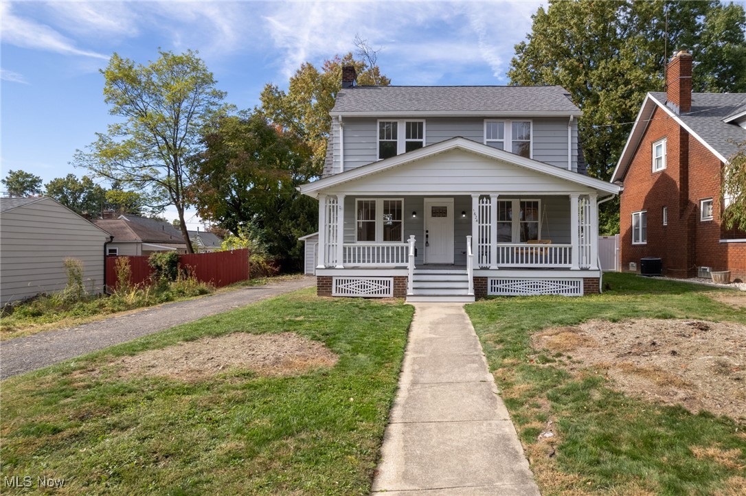 Completely Renovated Gem Near Downtown Cuyahoga Falls! Welcome to this flawless, fully redone home where every inch has been thoughtfully updated with high-end finishes and modern style! Located just minutes from downtown Cuyahoga Falls, this home combines the charm of an established neighborhood with the comfort and confidence of a total renovation. Step onto the inviting front porch, complete with a porch swing—the perfect spot to unwind and enjoy the neighborhood. Inside, you’ll immediately notice the all-new flooring throughout and fresh, modern paint in every room. The spacious living room centers around a beautiful wood-burning fireplace, offering a cozy focal point and warm welcome. From there, flow into the large dining room, ideal for family gatherings or entertaining guests. The stunning, completely new kitchen is a true showpiece—featuring white quartz countertops, brand-new cabinetry, stainless steel appliances, an undermount sink, floating shelves, and a pantry for extra storage. Every detail has been carefully chosen for both style and function. Both bathrooms have been completely gutted to the studs and rebuilt with modern fixtures, fresh tile, and flawless finishes, giving a spa-like feel throughout. Enjoy the added living space in the three-seasons room at the rear of the home, perfect for morning coffee or relaxing with a book. Every mechanical and cosmetic element has been addressed—brand new furnace and air conditioner, new lighting throughout, and a waterproofed basement completed in 2017 by Ohio State Waterproofing, complete with a transferable lifetime warranty for peace of mind. Outside, the large fenced yard is ideal for pets or play, and the two-car garage offers plenty of storage and convenience. From top to bottom, this home has been completely transformed—nothing left untouched, nothing left to do but move in. This is Cuyahoga Falls living at its best, just minutes from restaurants, shopping, and all the energy of downtown.