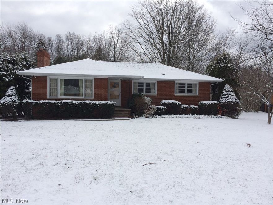 Great location, This Brick Ranch with full basement back's up to over 100 acre's of Lake Metro Park owned property that overlooks the Grand River. A brick 2 car detached garage with a newer concrete driveway. Hardwood floors in all bedrooms and living room. This home was built by the owners and has been very well maintained over the years. This is a solid home in a quiet community, and a great find for a young family, or Golden Ager's looking for a ranch style home.