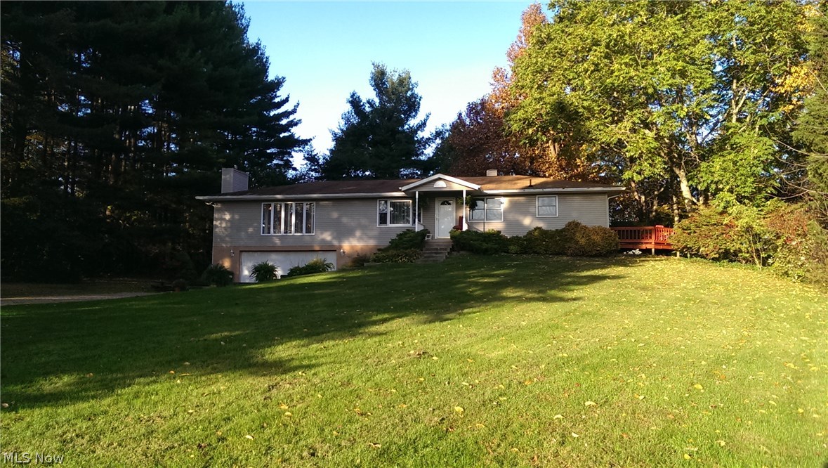 Enjoy beautiful sunrises and stunning lake views from the kitchen, dining room and living room in this large raised ranch with 4 bedrooms, 2 full baths and 3 car garage. Large master suite with walk in closet, large jetted tub and separate shower. Spacious L-shaped deck and 8x10 storage barn. Garage has 2 car entry with 2 car lengths deep on one side for space for 3 cars. Lower level room under great room is carpeted, was cleaned, may need replaced.