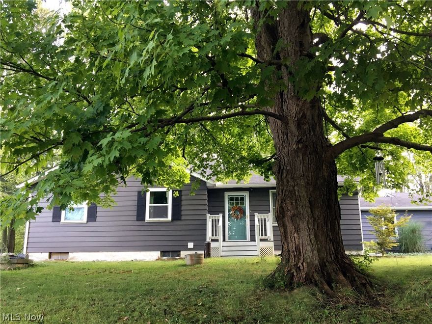 There aren't many homes that come available in this area especially in this price range. Don't miss the opportunity to own this country charmer. Upon entering the front door you will notice an open floor plan with a large living room, dining room and kitchen. Newer laminated wood floors flow throughout the main living areas and the bedrooms. The kitchen has ceramic tile and the dining room leads to a newer deck overlooking a beautiful wooded and private lot with very little traffic. Off the dining room you will enter a large office area which then leads to a 15 x 15 bonus room. It can be used as another bedroom, office studio if you work from home, den or playroom. There have been many updates in recent years to include Hot Water Tank, Roof Tear Off (2009), New Septic System (2009) and County Water Hookup (2012). The basement has also been waterproofed in September 2018 with a renewable lifetime transferable warranty. Owners are also offering a 1 Year Warranty to give you peace of mind