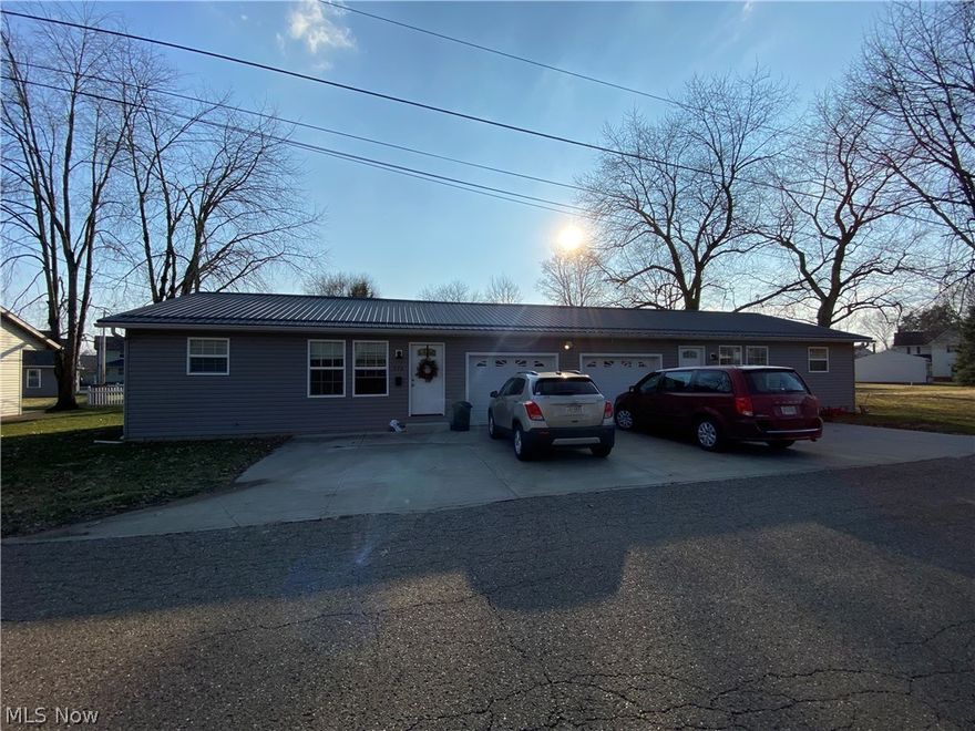 LOCATION LOCATION :  Side by side duplex built in 2016.  Each unit offers a nice floor plan with modern updates.  These units each include 2 bedrooms, 1 bath, laundry room, and 1 car attached garage. This duplex is in an excellent location - near New Philadelphia High School, Tuscora Park and downtown shopping.  This property offers easy low maintenance.  Call today for your private showing.