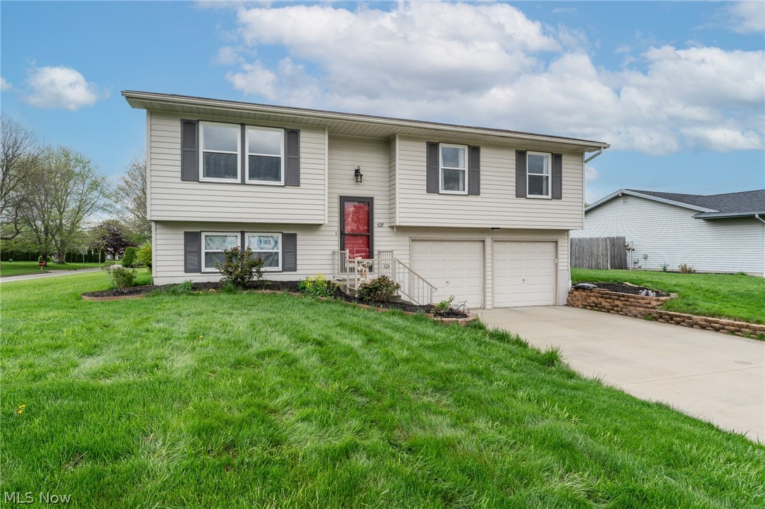 Updated Boardman Bi-level. This 3 bedroom 2 bath home features a newly redone kitchen with antiqued white cabinets and all black appliances to remain. From the extra deep sink with new spray faucet to the trash compactor.. no detail was left undone. The spacious eat in area with modern light fixture is large enough for family gatherings and opens to the bright sunroom with all new windows and porcelain tile floors. Large living room with lots of natural light leads down the hallway to 3 nice sized bedrooms and the remodeled main bathroom. Here you will want to note the granite, new porcelain tile and the lighted fog-free mirror. The lower level opens into the large family room with attached second bathroom. The laundry, tons of storage and access to the two car garage complete this level. Home has a great deck with steps to the yard that is over a third of an acre. Under deck enclosed storage and a shed complete this package. Don't miss this one! It's going to go fast!