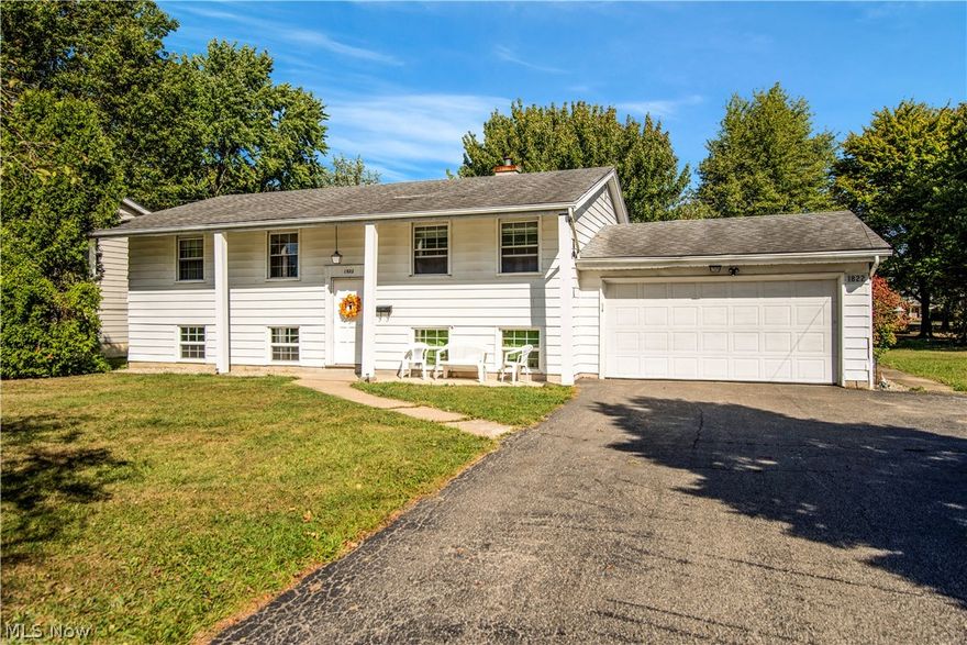 HANDYPERSON SPECIAL!!! Four-bedroom, split-level home located on quiet street in charming neighborhood. Well-appointed living room with huge, wall-mounted TV. Dining room opens onto wooden entertainment deck. Main level features three bedrooms and full bathroom, while lower level comprises large recreation room, a fourth bedroom and second bathroom. The home also has an attached, partially-finished apartment, ideal for in-laws or rental income. Large, flat-screen TV, fridge, gas oven, dishwasher, washer and dryer all included. Please note that Open Enrollment is available at Struthers City Schools.