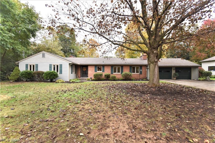 Welcome to 1631 Overlook Rd, a gorgeous 3 bed / 2 bath ranch sitting on a .65 acre lot in Twin Lakes! Completely renovated in 2005, this home features a 3 seasons room, 3 fireplaces, first floor laundry, and more! The owner's suite includes a large bedroom, two walk-in closets, a dressing/vanity space, and a bathroom with a double sink vanity and attached laundry. The remodeled kitchen boasts natural maple cabinets with matching facing on the appliances, LVP flooring, and a large pantry. Walk out from the dining/family area into an enormous 3 seasons room adjacent to a patio with waterfall feature. Full walk out basement provides ample storage, a rec room, workbench, and a space currently used as a fourth bedroom. Attached 2 car garage featuring nature stone flooring. Roof, insulation, siding, windows, HVAC, electrical panel - all 2005. 3 seasons room roof - 2021. Conveniently located next to a beautiful golf course and downtown Kent entertainment! Don't miss your opportunity to own th