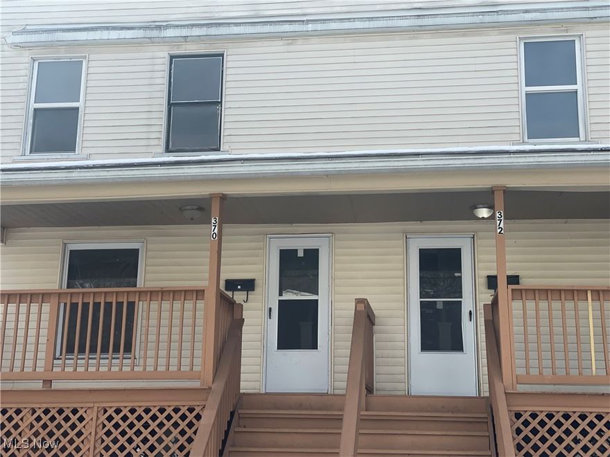 This very spacious townhome is designed with neutral colors. Enter the home from the covered front porch, which welcomes you into the newly carpeted living room and dining room. The kitchen is equipped with a stove, refrigerator, and counter/cabinets. There is a back door that is a second exterior door. The upstairs has two very spacious bedrooms and a full bath. Residents will be responsible for gas and electricity. All interested applicants can apply online with a $55 application fee per adult.