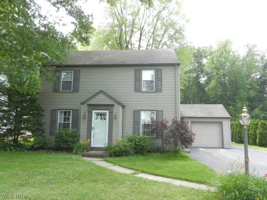 Wow! Absolutely Adorable! Move Right In - Tastefully Decorated...3 Bedrooms, Living Room w/Hardwood Flooring, Gas Log Fireplace and Built-Ins..  Family Room Opens to the back Deck. Trendy Formal Dining Room w/hardwood flooring  New Tile In Kitchen, Bar Seating and Pantry.  Updates include:  Windows 6 Years, Furnace and A/C, New Tile in Kitchen, 2 new storm doors, new surround in Bath. Roof 11 years old, Attic offers 2 cedar closets for Extra Storage.  Possibility of finishing off 3rd floor attic.  10x10  Shed.  Extra parking 2/3 Car tandem garage, delightful deck , Patio and Deep, deep back yard with room for a a summer garden!  Buy to start the garden to harvest in the fall...