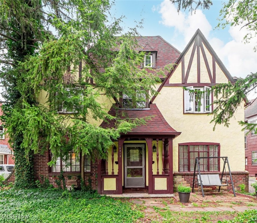 Quiet comfort awaits in this beautiful Tudor in Shaker Heights. Perfect for a responsible tenant looking for a peaceful, low-key space with classic character and historic charm. Just over 1300 sqft, this spacious second floor unit features 3 bedrooms and 1 full bath. Traditional crown molding, hardwood floors throughout the unit and a wood-burning fireplace adds a cozy touch in the living and dining room. Appliances include refrigerator, dishwasher, and stove/range for tenant use. A washer and dryer is conveniently located in the basement along with additional room for storage. Located between Shaker Town Square plaza and the Van Aken district, groceries, coffee shops, entertainment, and public transportation are all less than 5 minutes away. Walkable neighborhood with easy access to essentials while maintaining a sense of calm and privacy. Not to mention, the pride of the Shaker School district. Pet friendly with deposit and monthly fee. Sorry NO SECTION 8 or EDEN. Seeking respectful, long-term renters with a minimum credit score of 600. If that's you- schedule your private showing today!