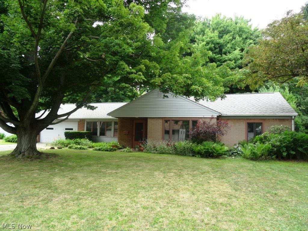 First time offered! You will fall in love with this adorable sprawling brick ranch nestled on a 1/2 acre lot in Kent, close to river bike path, parks, and kayak/canoe rentals. The free flowing floor plan is highlighted by a gorgeous 23 x 31 great room w/vaulted ceiling, gas fireplace, and ceramic flooring. Spacious kitchen offers ample counter/cabinet space, opens to a formal living room (wood burning fireplace, and hardwood flooring!), and large formal dining room w/exposed brick and built-in shelving. 3 bedrooms and 2 full baths, along with convenient 1st floor laundry (washer and dryer included!), attached 2-car garage w/additional overhead space, plus pull-down attic access for tons of extra storage! Enjoy evenings on the back deck (hot tub included if desired!), surrounded by a treed yard (partially fenced), and fire pit!