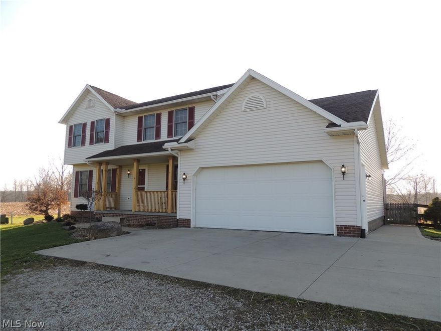 Pride of ownership shows in this custom built two story set way back off road on manicured 3 acres. Owner has added some newer updates with huge first floor laundry room, first floor half bath, large wood mantle on wood-burning fireplace, sun room with great natural light coming in and pellet stove that can heat the entire home. The finished lower level boasts a media room with surround sound wired, separate exercise room or office area, and newer carpeting.  Off sun room you can go out to the huge deck area which includes a gazebo and newer level with pergola, preset for a hot tub if wanted.  The multi area outbuilding has over 2200 sq ft of space with concrete floors, 220 electric, drains, 10 ft. high door for camper/trucks,  and a spot to install wood-burning stove if wanted. Mechanics dream garage. (Car lift can be negotiated in sale) Real piece of country tranquility in this property, but still close enough to get to shopping and freeways within 15 minutes.