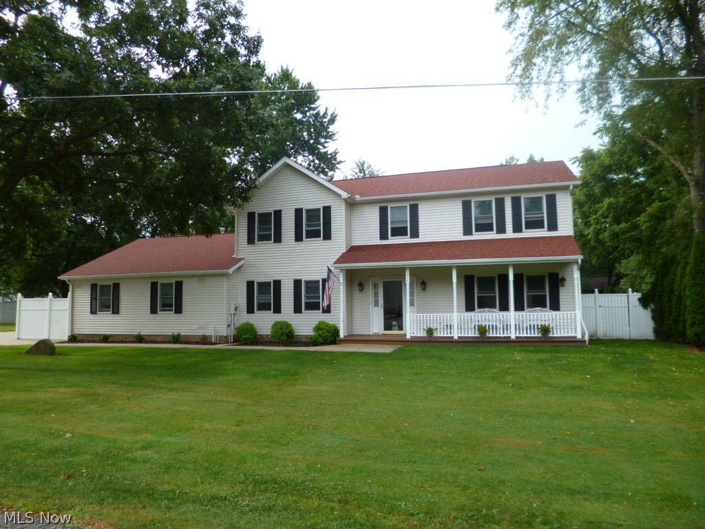 Pride of ownership shows in this Portage Lakes home. Neutral décor. Home has great curb appeal! Open floor plan perfect for entertaining. Gourmet kitchen w/center island, stainless steel stove, dishwasher, cast iron sink w/insta hot water. Upgrades within the last 2 years include new baths, doors, ceiling fans & Pergo flooring just to name a few (list will be available ath the home). Fully private 6 ft vinyl fencing, RV parking, 200amp service panel. Schedule your showing today, great time to buy, move in & be settled before school starts.