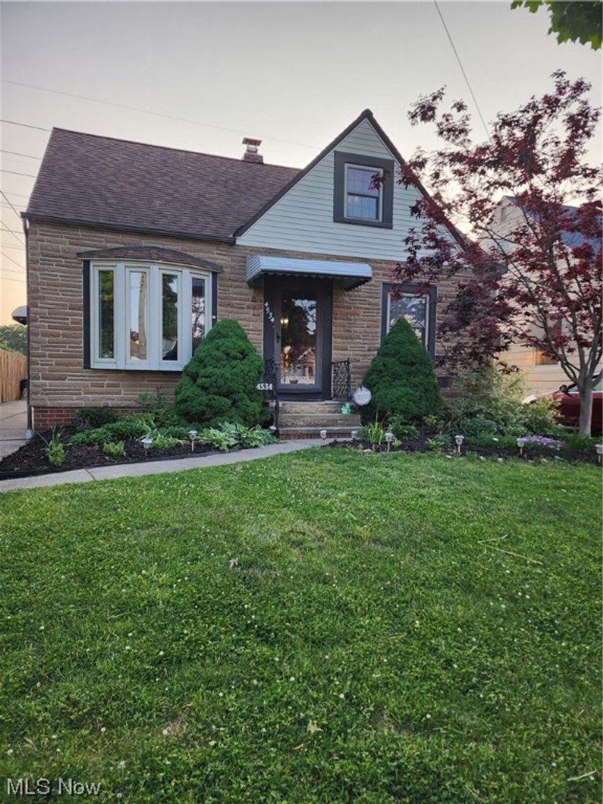 Welcome to 4534 Outlook Drive! This Brooklyn brick & vinyl bungalow has 3/4 bedrooms, 2 full baths, a family room addition, finished bsmt, a spacious outdoor patio, extra-large 1 car garage, ALL nestled on a beautifully landscaped, 40'x188.5 (0.37) acre lot. On the first level, gorgeous luxury vinyl plank flooring, a formal living room with a bay window, 2 bedrooms, a full bath, and a centrally located kitchen ~ the ref, range, microwave & dishwasher stay. You will absolutely love the enormous, open-concept, family room! This living space permits you to combine your dining & family room together which is perfect for family gatherings or entertaining family & friends. On the 2nd level, a multi-use loft, storage & a master bedroom with WIC. On the lower level/basement, a utility room, laundry room, full bath, large WIC & a 4th bedroom, home office, or game room! The exterior is landscaped with a spacious outdoor patio. The yard is fenced with additional green space stretching 75'x157' be