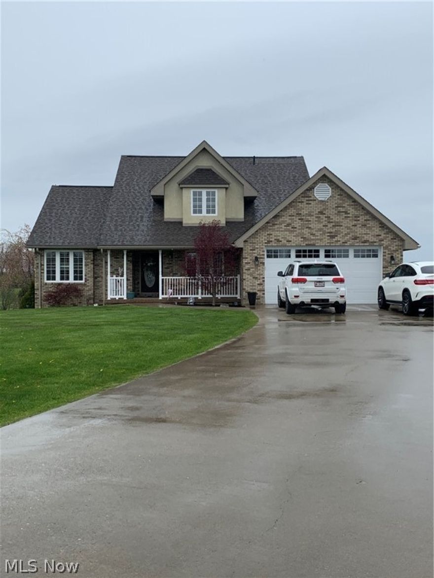 Sitting on a beautiful level lot in a very quite sub division with great curb appeal this home is a must see! The views are just outstanding with Bark Camp State Park within a mile. Just minutes from I-70, 10 minutes to St. Clairsville a few more minutes and over the Ohio River into West Virginia. I noticed a beautiful fenced back yard area with propane gas fire pit and sitting area. Nice yard with 2.33 acres. This home has recently been beautifully updated! Amish CUSTOM kitchen cabinets are natural worm holed hickory , quartz counter tops with sparkle, lighted glass doors, and a very large island with a beverage cooler and electric. Full farm sink along with Thermador built in refrigerator. The surface burner has induction burners and also there is built in double ovens. updated lighting throughout the house. 4 bedrooms, 3 full updated baths, the master bedroom, master bath are on the main level along with one additional bedroom. 12’ high ceiling in the entry. Black iron railing leads