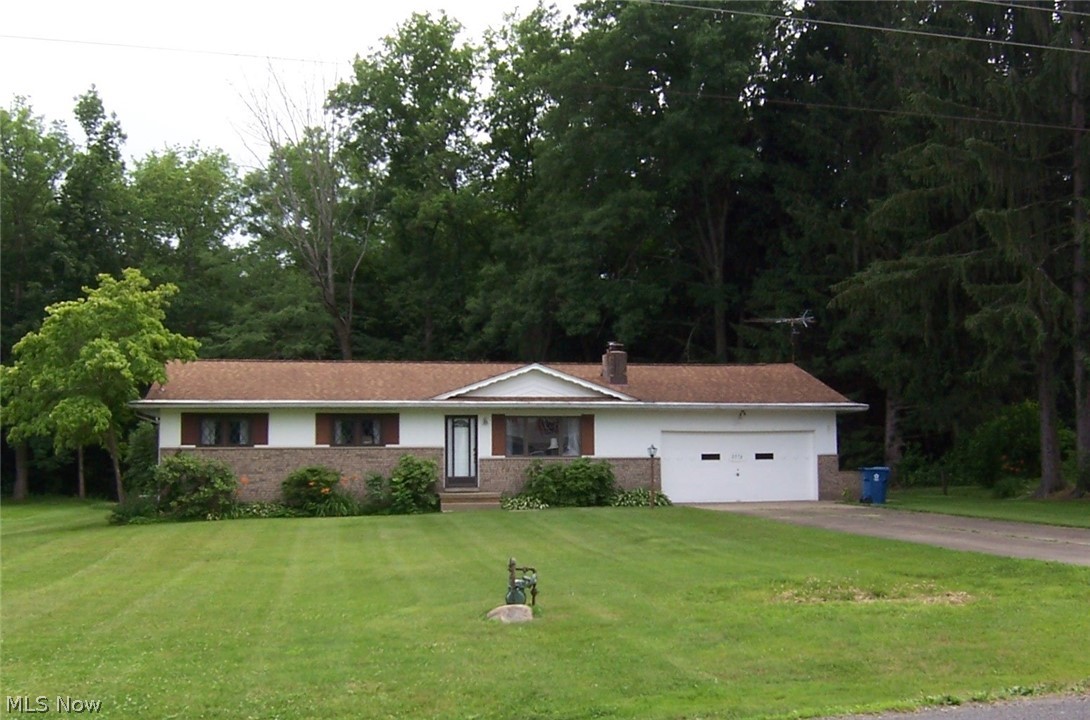 This lovely home was Amish built and has been lovingly cared for by the original owner. There has never been pets or smoking in this home! Under the carpet, there are hardwood floors in the living room and all bedrooms. There is great storage thru-out. The appl kitchen has beautiful original cabinets with extras like a built-in pantry and desk, as well as a built-in china cabinet in the dining area. The cozy living room boasts a half brick wall wood burning fireplace with a raised hearth! The master bedroom has a walk-in closet and a smaller closet (his & hers), and a full bath. There is a built-in linen closet and down the hall is the second full bath with a tub shower and vanity with double sinks! And for the man in the house, there is a large finished area in the lower level that with some updating would make the perfect man-cave! The house sits on a beautiful half acre lot with woods and a creek in the rear of the property. A new roof was put on the home and a Trane furnace install