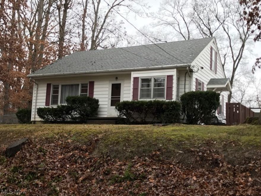 Ready to move into ranch home on northend. Fenced back yard. carport attached to one car garage. New hot water tank. New roof on garage. Beautiful hardwood floors just redone in living room. Attic could be made into 3rd bedroom