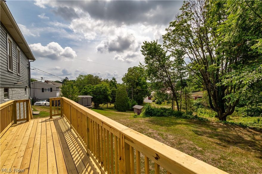 Welcome to this beautifully remodeled home featuring four bedrooms and two baths. On the first floor, you'll find two bedrooms, a fully renovated bath, a spacious living room, a formal dining room, and a stunning kitchen with brand new cabinets, granite countertops, stainless steel dishwasher and brushed gold fixtures. The home boasts modern lighting, some new switches, outlets, and some new windows. The second floor offers two additional bedrooms, providing ample space for family or guests.  This charming home has been meticulously updated, ready for you to move in. The property includes a new kitchen and bath, ensuring both modern convenience and style. A new roof offers peace of mind, while fresh landscaping enhances the curb appeal. The interior and exterior has been freshly painted for a crisp, modern clean look. The waterproofed basement, which comes with a warranty, adds extra space with a new bathroom with a spacious shower, perfect for additional living space or storage. Inside, enjoy new flooring throughout and a soon-to-be-installed new air conditioner for year-round comfort. A one-car garage provides convenience, and the deck and backyard offer great outdoor space for relaxation or entertaining. Conveniently located close to the hospital, shopping centers, and doctors' offices, this home is ideally situated for all your needs. Don’t miss out on this move-in-ready gem! Owner is an agent.