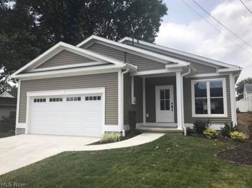 This is a beautiful one story contemporary fenced "NEW BUILD" on an attractive lot with landscaping.  Inviting living room open to kitchen where you will find stainless steel appliances and a modern butcher block island and corian kitchen countertops.  All neutral décor throughout and detailed trey ceiling in the Master Suite.  Large Master Bath as well as a large 7 x 8 approx. Walk in Closet.  Covered back porch for entertaining with doors leading from the Master Suite to. Fireplace an Wet Bar with Cooler in Living Room for company.  Home was well thought out and has all of the bells and whistles.  Recessed Accent lighting is not only in the interior but flows to the exterior and garage of the home.  Too  much to mention in this very attractive one story.  Do not let this IMMACULATE home slip by.  

Currently taxes are assessed on the lot only.