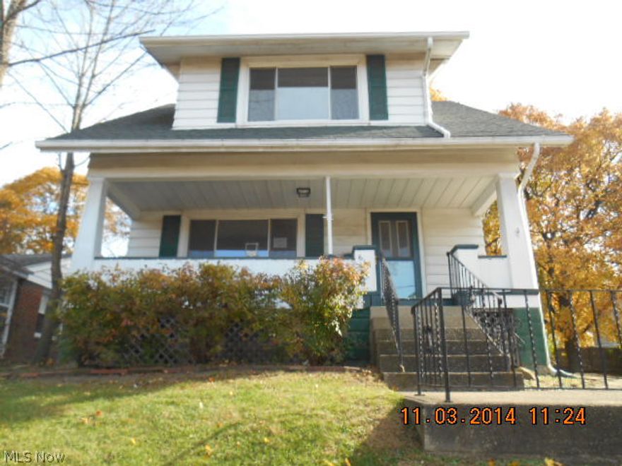 Property being sold with repair.  Home sits high off the road, nice lot.  Eat in kitchen that leads to 2 a large deck.  Hardwood floors in living and dining rooms.  Basement has glass block windows.  2 car detached garage.  Call today to see this home and with a little TLC and your own personal touches, you can make this your own!