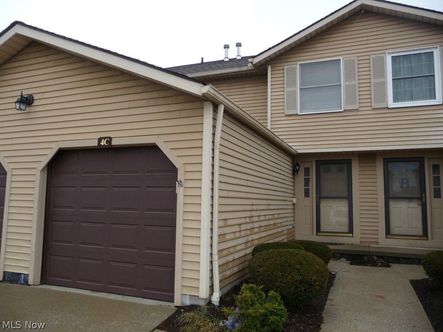 Absolutely turn key, move in and enjoy! Updates galore including newer central air conditioning, stove, refrigerator, dishwasher, wood deck, hot water tank, commodes, carpet, vinyl flooring and more. Spacious living room features decorative stone fireplace and sliding doors to private fenced exterior patio. Kitchen features newer appliances, flooring and breakfast bar seating for 5! Enormous master bedroom suite with loads of closet space and built in shelves. Bonus full finished lower level with new carpet. Washer and dryer included! Attached garage with built in shelving. Immaculate and clean, won't last! Possible owner financing as well!