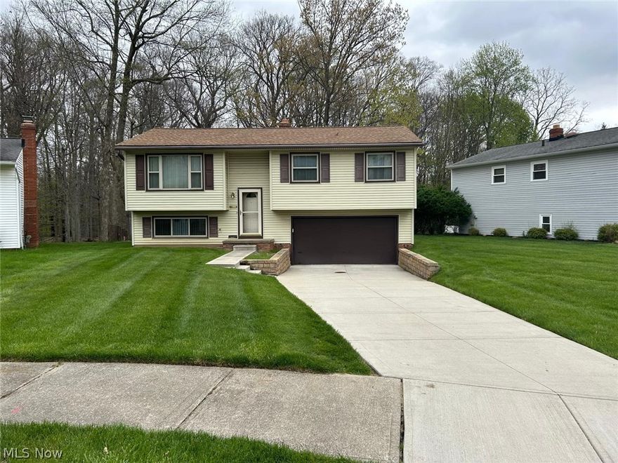 Welcome to this well-maintained bi-level home located in the heart of Bedford Heights, offering a comfortable and functional layout with 3 bedrooms and 2 full bathrooms. This property features a 2-car attached garage providing ample parking and storage, along with a finished lower level that adds valuable additional living space—perfect for a family room, home office, or entertaining area.

Step outside to a rear deck ideal for gatherings, outdoor dining, or simply relaxing. The home also includes a recently updated concrete driveway, central air conditioning, and a water softener for added everyday convenience. Major improvements have been completed over the past 5–10 years, including a solid, well-maintained roof.

Ideally situated near I-271 and I-480 for an easy commute, and just minutes from Bedford Reservation and local parks, this home offers a practical combination of space, location, and functionality in an established neighborhood.