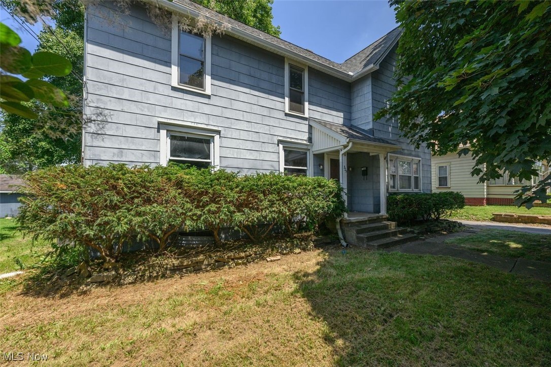 This two story colonial has so much potential! Bring your special talents and make it shine! This home offers a large dining room and living room that include original woodwork and doors. Three bedrooms located on the second floor with a large foyer area and full bath. The basement features a walk up access to the fenced in backyard. Also included is a detached 2 car garage. This home is located close to shopping, restaurant's, parks, and library. Agent owner/not listing agent.