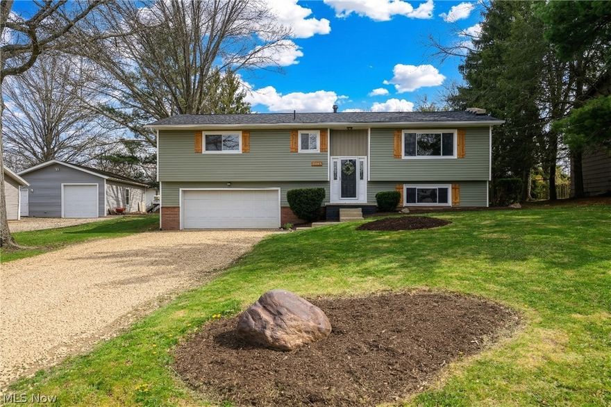 Check out this absolute gem located in Canal Fulton! This 4 bedroom, 2.5 bath home has been completely remodeled from top to bottom. Boasting close to 2,000 square feet and situated on a sizable lot in a very desirable neighborhood the setup could not be better. Make your way to the upper level and you have a beautiful open concept living space complete with luxury vinyl plank flooring with an accent wall. The living/dining area flows perfectly into the renovated kitchen offering solid wood cabinets, granite countertops, tile backsplash and all new appliances. This gem also has a wonderful owner's suite complete with an on-suite half bath. Not only that it offers 3 additional generously sized bedrooms and 2 totally remodeled bathrooms. This home truly has it all. Don't wait! Call for your showing today!