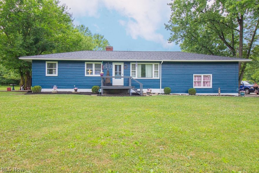 Cute And Cozy Ranch on over 2 Arces in Columbia Township! Here's the one you've been waiting for! Perfect for First Time Home Buyers or Down-sizers! New Roof 2020 and Siding Freshly Painted! Updated bath, 3 bedrooms and a cozy eat in Kitchen . Come and Finish the basement that includes a wood burning fireplace! This home Features an attached 2 car garage, and 2 barns for storage. With all of its charm, This one wont last long!! 1 Year America's preferred home warranty included!