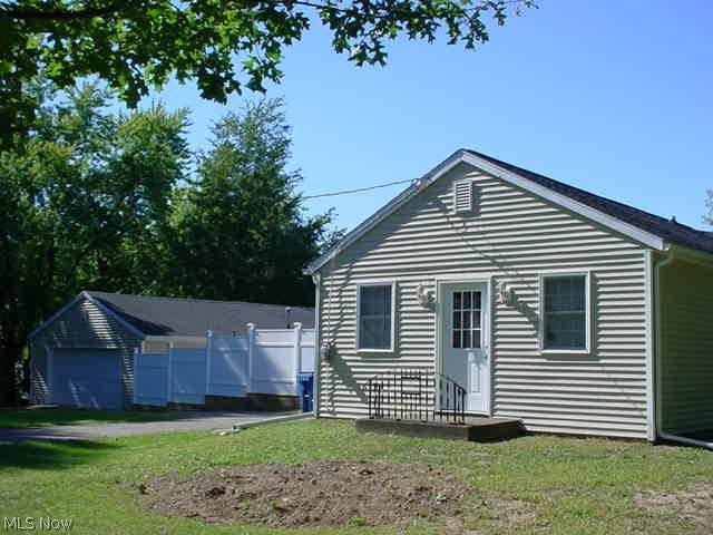 2-3 bed ranch w/4 car heated garage, 2 car wide and 2 deep! 2 year old 24' round above ground pool w/heater and large deck, privacy fenced! Remodeled home, newer carpet, paint, kitchen! 2007 roof, 2008 siding & windows, 2010 furnace! Cathedral ceiling in eating area! Remodeled bath! 3rd bed does not have closet. City water & sewer! Central air! Just move in and enjoy!