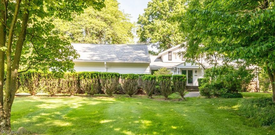 Spacious Cape Cod on sprawling 1.4 acre lot in Pepper Pike. With three bedrooms and two full baths on main level, this home is perfect for those seeking the convenience of single floor living! Entry with slate floor opens to oversized combination living and dining rooms, with picture window and sliders overlooking the private, landscaped back yard. Perennial plantings and trees tended by long term owner provide blooms throughout the year! Large, updated eat-in Kitchen with all appliances has ample storage and counter space to please any home Chef! Inviting wood paneled Family room off Kitchen has fireplace with stone surround and mantle and wood parquet floors with built-in bookcases. Laundry room off Kitchen has washer and dryer plus extra storage space, with convenient half bath and garage access. Spacious Master suite on first has updated full bath with double wide step-in stall shower. Two other bedrooms on main level share full bath in hall with double vanity and shower over tub. Additional living suite on second floor is perfect for another Master or Teen suite, with gleaming wood floors and large full bath with dressing area with vanity and double closets! Rec room in basement could easily become space for play or media rooms. Newer HVAC in 2021. Roof in 2020. Exterior painted in 2022. So convenient to shopping and dining, walking trails and parks! Award winning Orange schools. Great value for Pepper Pike!