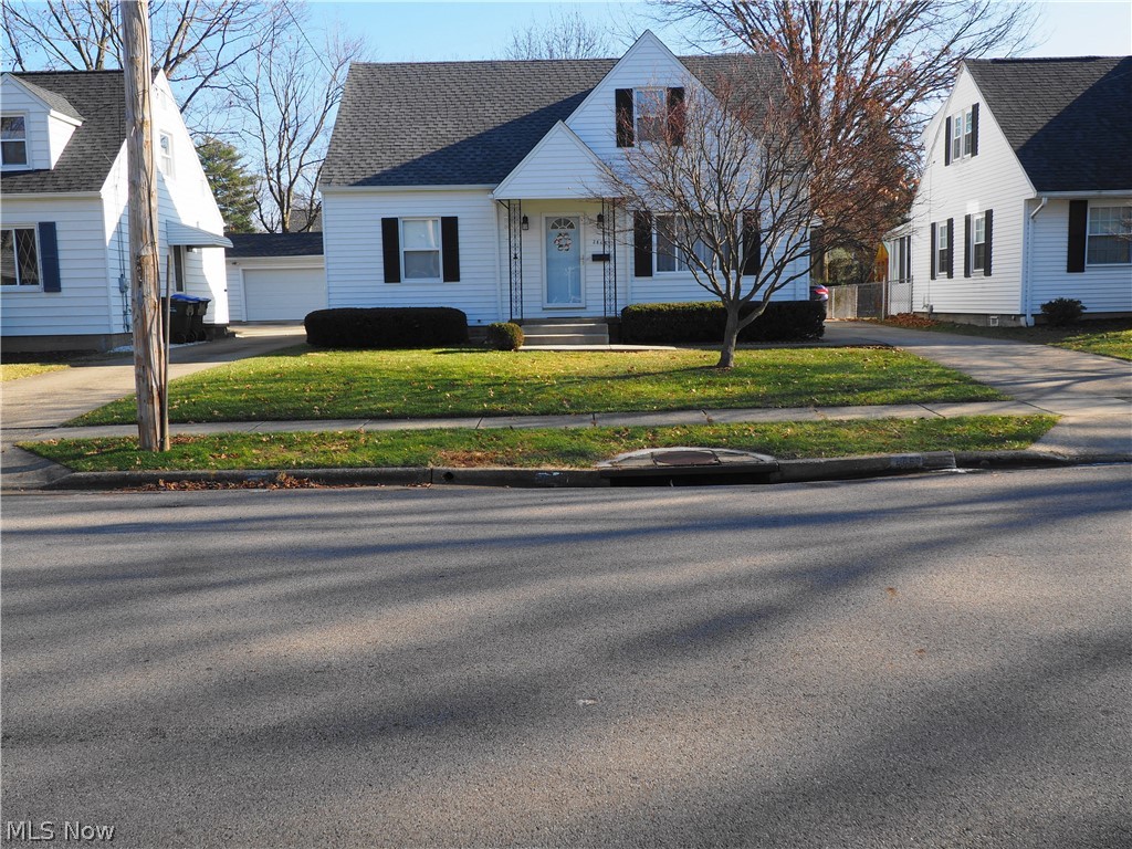 Lot: 50' X 121' Roomy, well maintained cape. Applianced kitchen with plenty of cupboards and granite counters, great wall oven and countertop gas range plus a new microwave make cooking and being in the kitchen a pleasure. Updated bathroom. The roof was replaced on the house and garage in 2021 also with new gutters and downspouts. The exterior was freshly painted in July 2021. Furnace is about 8 years old, central air 2017 and hot water tank 2020. The bedroom up has been updated with laminated floors and a new ceiling plus built-in storage and large closets. The basement has a large recreation room and the basement has been waterproofed plus a back-up water valve was installed in 2019. Glass block windows in the basement. If you like DIY projects there's a workshop with a work bench. 2 car garage with a paved drive and extra parking spaces. A one year home warranty is also included.