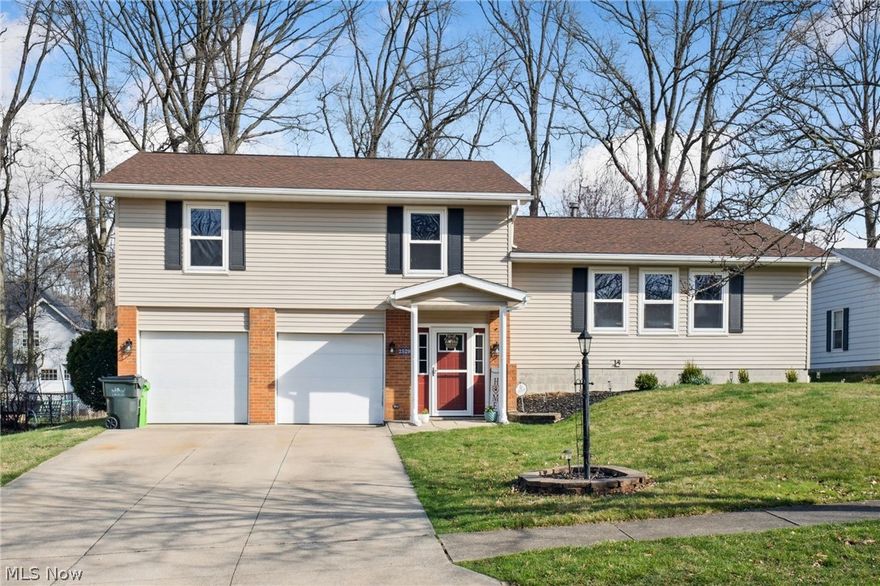 Introducing a stunning split-level home boasting charm and spacious living areas. This 4-bedroom, 2.5 bath home is move in ready! As you step inside, you are welcomed by a warm foyer leading to the inviting family room with a beautiful brick fireplace and sliding doors opening to the backyard. This level is completed with a half bath with new light, mirror and closet door. Head down to the lower-level basement, offering ample storage, a laundry area and a finished bonus room currently used as an exercise room. Head to the second level main living area where an abundance of natural light streams through the large windows and shows off the newly installed carpet. This space transitions to the dining area with new light fixture and nice hardwood floors. The heart of the home is the fully equipped kitchen, featuring a countertop bar and a door leading to freshly stained large deck overlooking the fenced backyard. The upper level has a full guest bath that has new mirror, vanity and flooring, alongside three nice size bedrooms and a Master bedroom featuring two closets and recently update bathroom with new tile shower surround, fixtures, flooring, vanity and exhaust. Most of the home has received a fresh coat of paint. Nestled in a sought-after neighborhood, enjoy the community Sherwood Acres Park with new playground equipment, a pavilion shelter and neighborhood activities throughout the year. Don't miss out on the opportunity to make this your dream home!