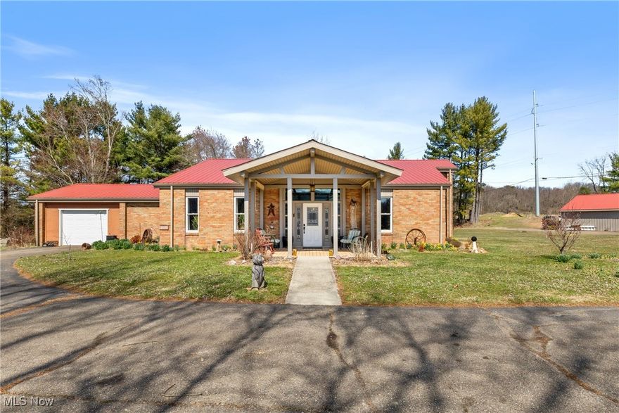 Offering over 4,100 square feet of living space on 5.5 scenic acres, this unique property is a rare find. Originally built as a church, it has been thoughtfully transformed into a stunning lodge-style home, showcasing custom craftsmanship throughout. Perfect for the outdoorsman or anyone seeking a peaceful country lifestyle, the property offers plenty of space for hunting, recreation, or even a mini farm. Inside, you’ll love the impressive two-story propane fireplace, expansive loft area, and the newly installed flooring in both the great room and the primary bedroom. Two outbuildings provide endless possibilities for hobbies, storage, or workshops, and the detached garages—measuring 32x30 and 28x52—ensure ample space for vehicles, equipment, or outdoor gear. Bring your dream of country living to life—there’s room for it all right here!