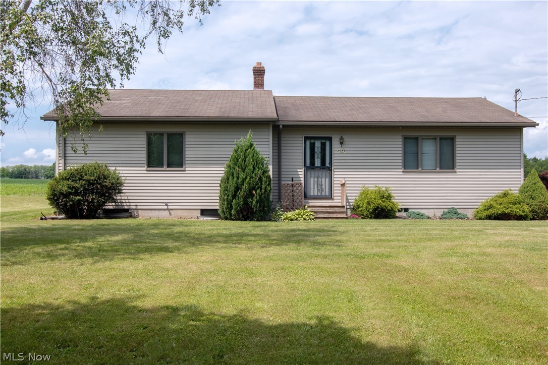 50.66 Acre Farm with 2 houses and frontage on (2) streets). House #1 is a Ranch style home with approximately 1466 sq. ft. of living space with 2 Bedrooms, 2 1/2 baths, a large Great Room consisting of Kitchen, dining and living room. Full basement, wood deck and a 2 car detached garage. House # 2 is a 748 sq. ft. former schoolhouse with 1 bedroom, 1 bath and a 1 car detached garage. House is fed water from a natural spring and has a gravel drive. Property is subject to CAUV Farm Recoupment. Buyer to re-apply or pay CAUV Farm Recoupment.