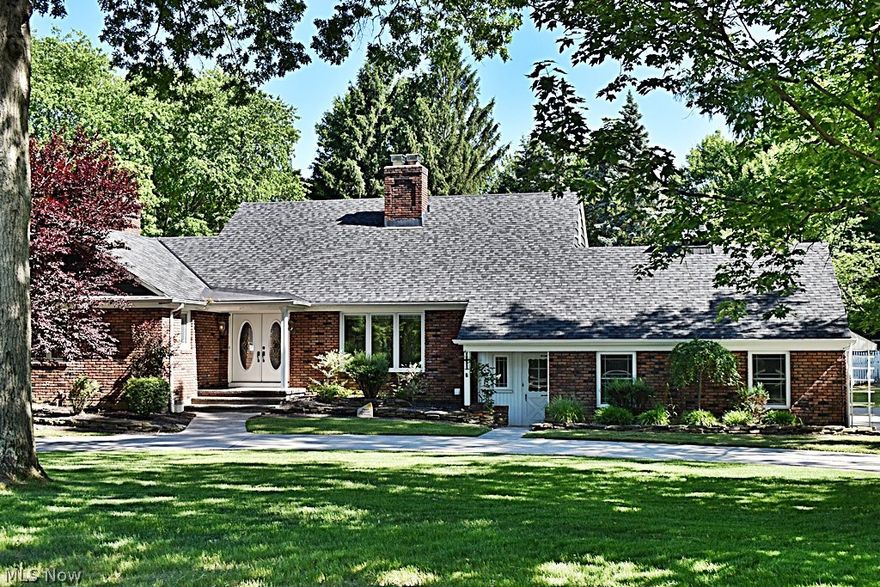 Gorgeous, one family owned Cape Cod set in the middle of 2 wooded parcels that give you a private 2 Acre lot!  Beautiful park-like setting yet close to freeways, shopping and entertainment.  Step into this bright, immaculate home and you'll immediately feel welcomed.  Foyer leads to private office with beautiful natural light.  Large Master Bedroom with updated Master Bath are also on this level.  Fantastic Family Room with built-ins and wood burning Fireplace will be the space your family and friends will want to be in! Family room opens to Dining Room and Eat-in Kitchen...all with views of the fabulous in-ground pool and wooded yard!  Sliders from Kitchen lead to the large patio and pool oasis...terrific for entertaining or private family evenings. First floor laundry / mud room with outdoor access and attached 2 car garage complete this level.  Three generous sized bedrooms are on the second level, all with great closet space.  Full Bath and Walk-in attic for even more storage.  And if all that isn't enough, there's a lower level Family Room with wet-bar area!  So much to enjoy in this home and all this just seconds away from the Metro Parks with hiking / bike trails...your own private retreat yet close to everything.  20 minutes from downtown Cleveland or Akron.  Home Warranty included for peace of mind. Walton Hills / Cuyahoga Hts School tuition program w/busing available.  Welcome Home to 16455 Egbert Road...nothing to do but move in!