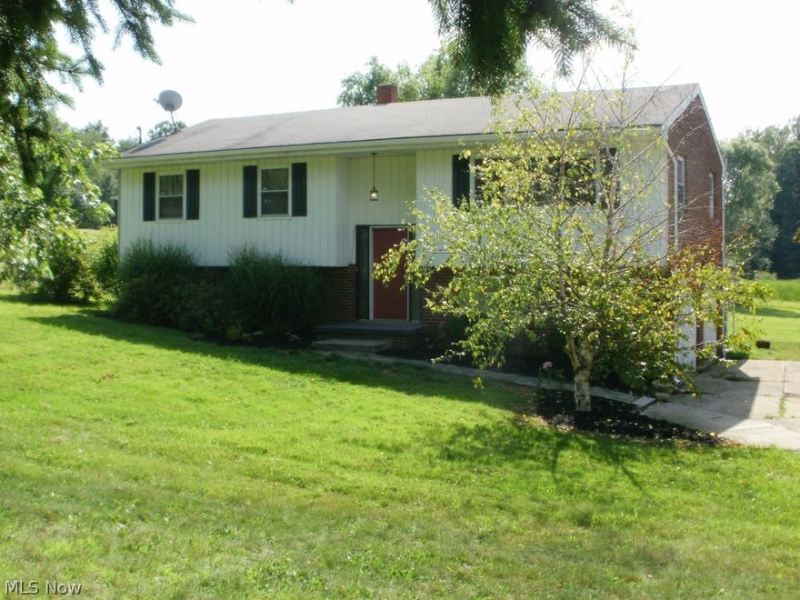 Very nice home situated on 2.63 country acres in Green!  Living room with newer carpet open to dining which is open to updated kitchen.  Both full baths have been updated.  Lower level family room with newer carpet. Most windows newer.  Spacious 2 car attached garage.  New gutters March 2015. New front storm door 7-15. Beautiful backyard with out building and patio.