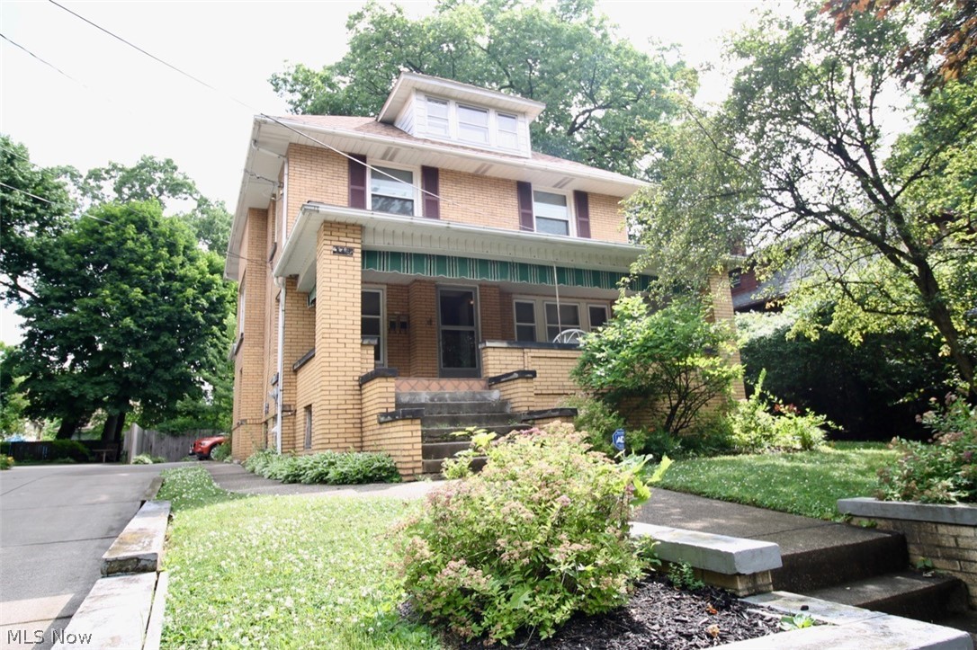 Beautiful brick exterior with large tiled front porch! This home has so many possibilities; continue to use as multifamily or convert back to single family. There is a potential for a 6th bedroom. The main floor has one bedroom with access to basement and full bath in basement. Main Kitchen updated in 2013, all cabinets, granite, microwave, dishwasher, flooring, lighting, stove and refrigerator 2015. Lower level bathroom completely redone, in 202 tub, shower, toilet, new exhaust fan, glass block, flooring, granite counter also finished basement and you will find hardwood under the carpet in the lower level. Roof replaced in 2008. The window A/C unit is 24,000BTU. Updated electrical with new panel. Third floor offers a bedroom and all new electric and has been painted 2020 with new drywall. Siding and parking pad replaced on one car garage with opener in 2016. Concrete driveway replaced in 2012. There is a 16x18 deck in the back to sit and relax as well as a 6' fence in the back. T