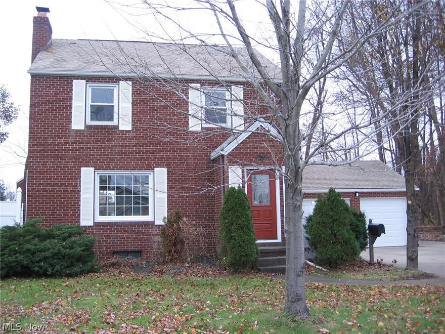 Adorable all brick, 3 bedroom, 1 full, and 1 half bath home in Shrine Village.  This home has been beautifully updated.  New kitchen with stainless steel appliances, new laminate wood floors, and gorgeous countertops.  Large living room with an abundance of natural light, wood floors and a stunning fireplace.  Additional features include an attached 2 car garage with new garage doors,  adorable deck, new windows, and large backyard.  Call today to view!!