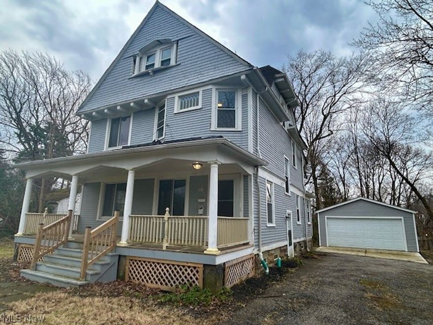 Stunning classic 1903 Colonial currently configured for two-family living, offering incredible flexibility and timeless charm. Nestled on a private, wooded 0.61-acre lot and set back nearly 100' from Chagrin Blvd, this property provides exceptional privacy and a peaceful, estate-like setting.  The home’s layout naturally lends itself to an easy and seamless conversion back to a spacious single-family residence, with existing stairwells already connecting all levels and a floor plan that flows effortlessly throughout.  The main level features an updated kitchen with vaulted ceilings, skylight, a center island with cooktop, breakfast bar, and ample space for dining. A spacious living room, three generously sized bedrooms, and an updated full bath complete the first floor.  
The second level, accessible via both front and side staircases, offers two bedrooms, a living room, updated full bath, and a bedroom currently used as a kitchen with updated features and room for dining.  This kitchen space could be effortlessly reimagined as an additional bedroom or office. 2nd floor also offers access to the finished third floor—ideal for a luxurious primary suite, bonus living space, or recreation room.  The full basement provides abundant storage, separate mechanicals, and individual gas meters, while electric is currently combined. A newly built detached garage adds convenience and value.  The Point of Sale report is available; the buyer is to assume all violations.  With its generous proportions, connected layout, and flexible living spaces, this home presents a rare opportunity to create a truly expansive single-family residence on a beautiful wooded lot; or keep as an income-generating 2-family investment property. Don’t miss your chance to unlock its full potential!  If converted to a SFR - Main floor would offer a Living room, Dining room, Kitchen, Office and full bath.  2nd fl would have 4 bedrooms and a full bath.  3rd fl would make a fantastic rec room or studio.