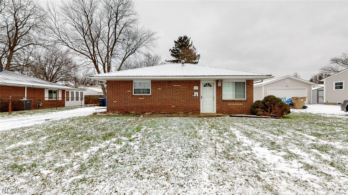 Are you looking for a well kept updated little house to buy in the Falls and call home? Here it is an affordable all brick home you can buy close to public transportation and on a dead end street. Home offers care free living a home warranty, all brick 2 bedroom 1 bath 2 car garage all updated, some of the updates include replacement windows 10 yrs, metal roof 2020, newer furnace, elec updated 5 yrs, remodeled bath with walk in shower & kitchen all clean and tidy nicely updated. Move in condition.