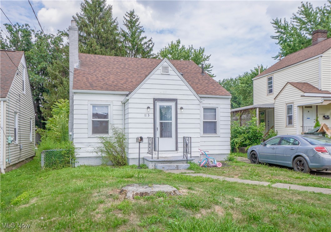 Investor friendly opportunity with a tenant already in place! This bungalow features a classic layout that's easy to keep rented. The main floor has vinyl plank flooring throughout, with archways connecting the living and dining rooms. The kitchen includes a convenient door to the driveway and backyard. Two bedrooms and an updated full bath complete the main level. Upstairs, you'll find a spacious third bedroom with a high ceiling and eave storage. A full basement adds extra space, and there's off street parking in the driveway. Great location near schools, public transit, and downtown.