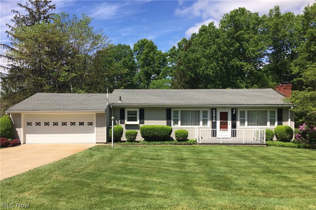 Curb Appeal abounds in this Original Owner 4 Bed, 2 Full Bath Ranch with newer roof & windows on a fenced 2/3 acre with park-like gorgeous backyard in Stow! Centrally-located to Routes 8, 59, 91, schools, shopping, library and restaurants. Hardwood floors under carpet in living, dining, hallway and 3 of 4 bedrooms. Seller has added composite front porch and there is a covered brick patio in the back. Convenient Bonus garage bay under main garage on rear of home for your lawn supplies or could be adapted for an off-season vehicle. Upper garage has new garage floor, recently-painted interior, 220 service and newer overhead door. Seller very recently installed new main gas line from street. Some wallpaper (see photos) and dated carpet over abundant hardwood. This property has great potential and may need the decorator touch of a new owner, but it has been wonderfully cared for and maintained by the original owners since the day it was built!! Glass block security windows in walk-out lower