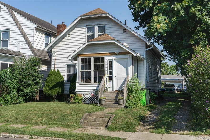 Welcome to this home in the heart of Massillon, perfectly located near restaurants, shops, and more!

The living room and kitchen are warm and inviting, featuring a cozy gas fireplace that adds character and comfort. Just off the main living area, the sunroom provides additional living space perfect for relaxing, reading, or enjoying your morning coffee.

The spacious upstairs bedroom serves as a private master retreat, complete with a large walk in closet and an additional storage closet in the hallway for added convenience. The second bedroom is located on the main floor, offering flexibility for guests, a home office, or other uses.

This home includes new gutters installed in 2025, a convenient wheelchair ramp connected to the back door, and a stove and refrigerator that stay with the home. The exterior is low maintenance vinyl siding with a durable shingle roof.

Cozy and welcoming, this well maintained home is ready for its next owner!