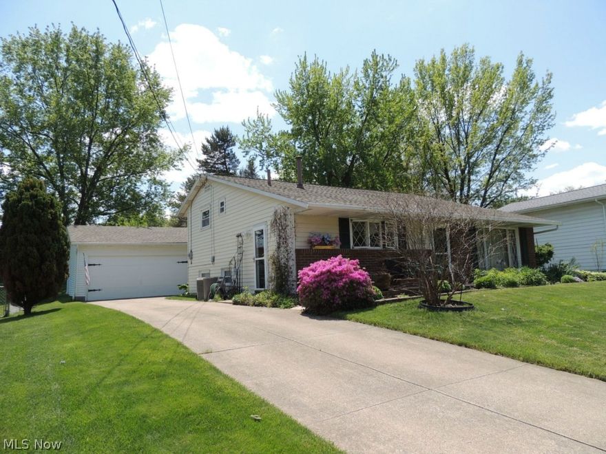 Pride of ownership in this neat, clean split level. Vaulted ceiling in living room with newer carpet. Updated kitchen with ceramic tile, mosaic backsplash, newer sink and countertops. All kitchen appliances stay. Home is in move in condition with 2 full baths. Concrete drive to 2.5 detached garage with lots of storage and room to work. Don't pass this one up, not a drive by.