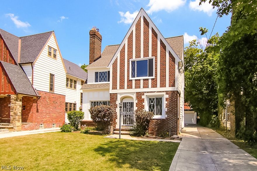 A gorgeous Shaker Heights tudor completely remodeled and ready for new owners. This home has a charming exterior and old world architectural detail throughout combined with modern and high end finishes.  The kitchen has been completely renovated and offers plentiful cabinetry with crown molding, granite counters, stainless appliances and custom tile work. The floors have been restored and refinished throughout. The third story offers an extra 500 sq ft of living space not included in the total square footage.  The basement has been finished for added rec space.  Enjoy peace of mind with a new roof, brand new mechanicals including central air, new windows, and much more!